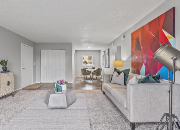 a living room with a couch and a table