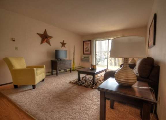 a living room with a couch and a table