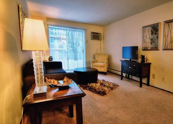 a living room with a couch and a table