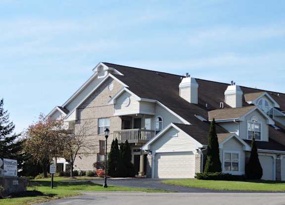 a apartment building with a street in front of it