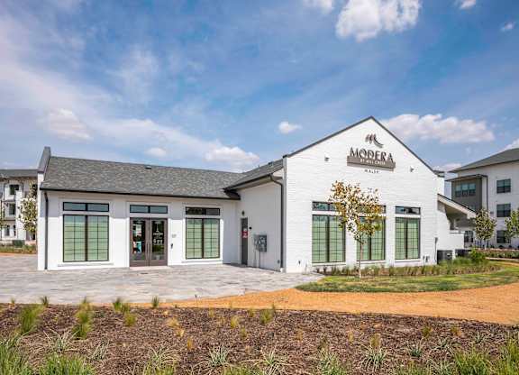 Full exterior of large clubhouse at Modera Walsh