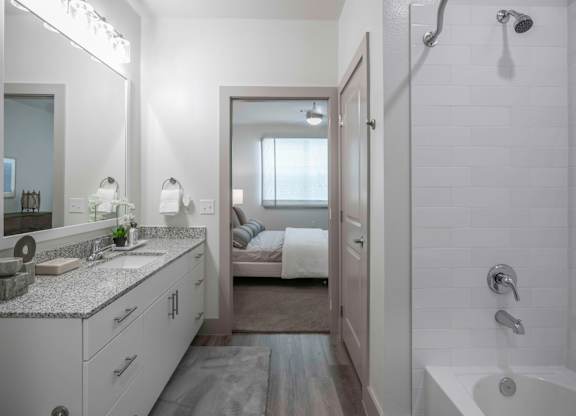 Serene bathroom with tub and shower