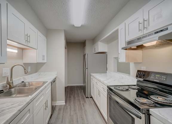 a modern renovated kitchen at Hills at Hoover Apartments