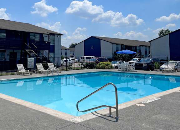 swimming pool with a ladder at Crosby at Westchase Apartments, Houston, TX