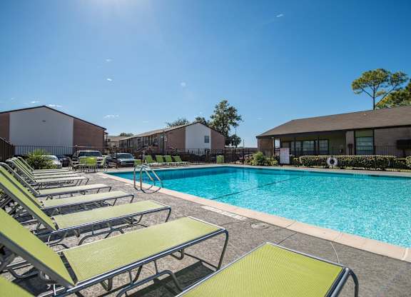our apartments have a large swimming pool with lounge chairs
