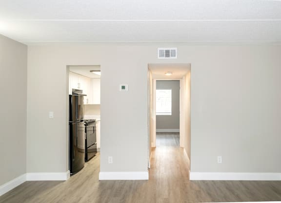A Ridge Apartment living room with an entrance to the kitchen and hallway