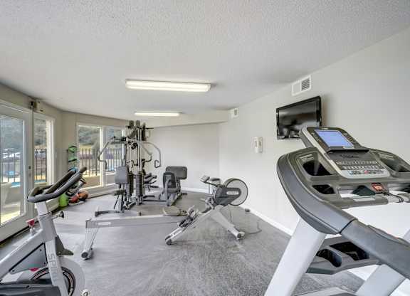 a gym with cardio and strength equipment at Hills at Hoover 35216