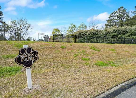 the sign in front of the bark park at Hills at Hoover 35216