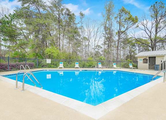 a swimming pool and sundeck at Hills at Hoover 35216