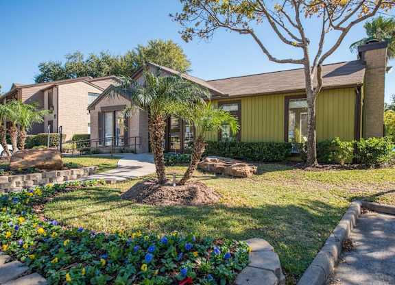 Lush, professional landscaping at Hudson at Westchase Apartments in Houston