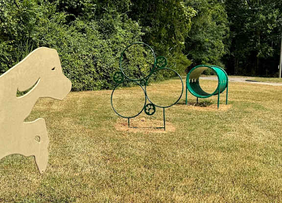 a park with a playground and a swing set at Spring Lake Cove Apartments, Birmingham