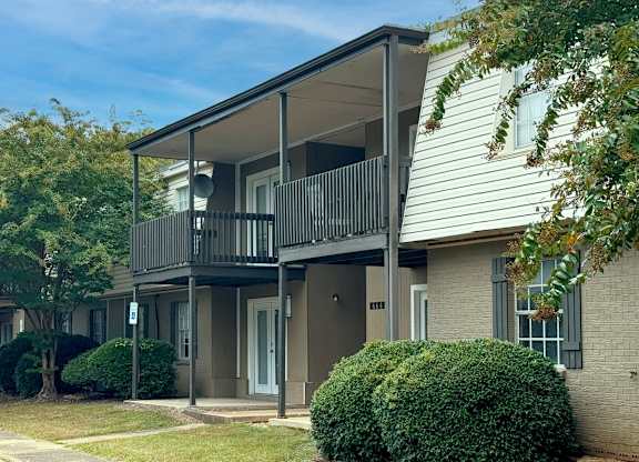 An apartment with a balcony at Spring Lake Cove Apartments in Birmingham, AL