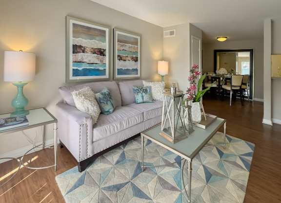 the model home with furnishings at Waters at Westchase Apartments in Houston