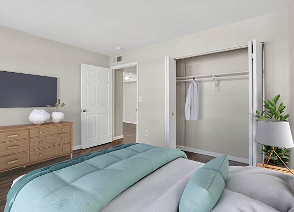 Bedroom and closet at Brentwood Apartments In Manassa VA