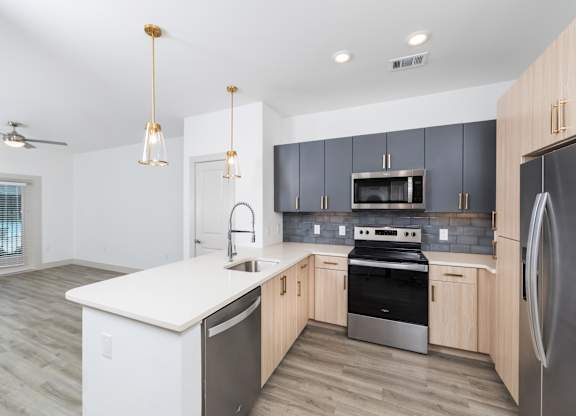 Kitchen island at 1900 Parmer Apartments in Austin TX