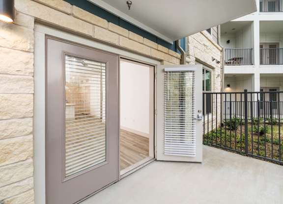 Exterior door at 1900 Parmer Apartments in Austin TX