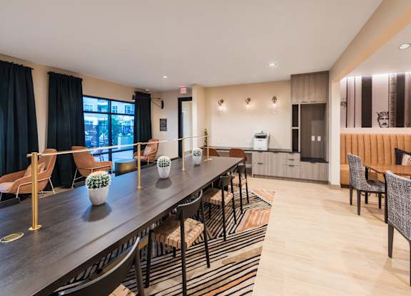 Social lounge dining area at 1900 Parmer Apartments in Austin TX