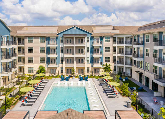 Large aerial view of pool at 1900 Parmer Apartments in Austin TX