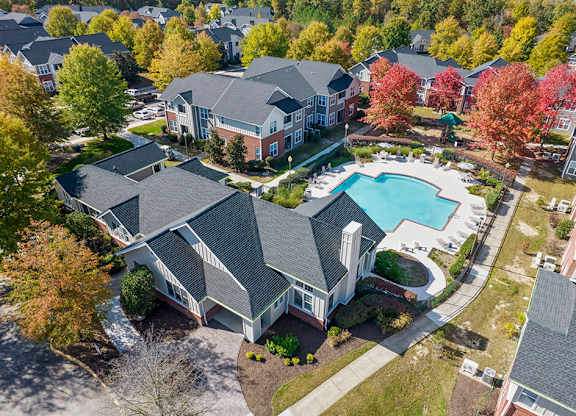 Aerial view of pool and landscaping at Grand Oaks Apartments in Chester VA