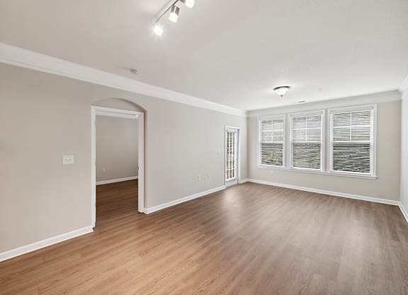 Living room with hardwood flooring at Westerchester at the Pavillions in Waldorf MD