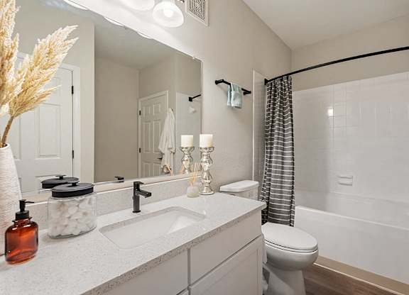 Bathroom with sink and shower at River Pointe at Den Rock Park in Lawrence MA