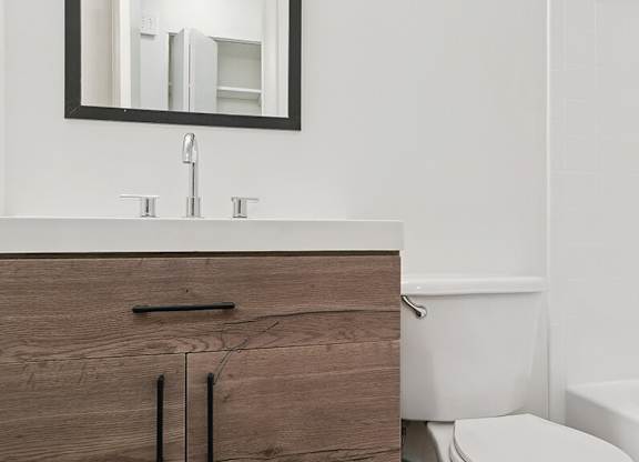 Bathroom with vanity at Oakfield Apartment Homes in Wheaton MD