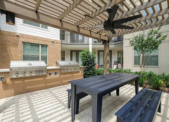 Outdoor grill area at The Sevens in Dallas TX