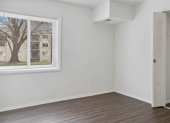 Bedroom and closet at Oakfield Apartment Homes in Wheaton MD