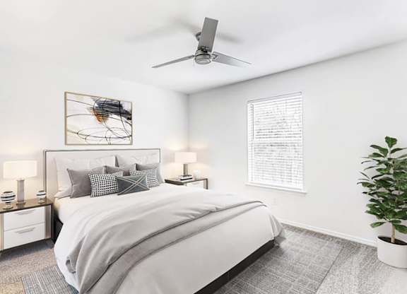 Bedroom bed at Landmark at Wynton Pointe Apartment Homes in Nashville TN