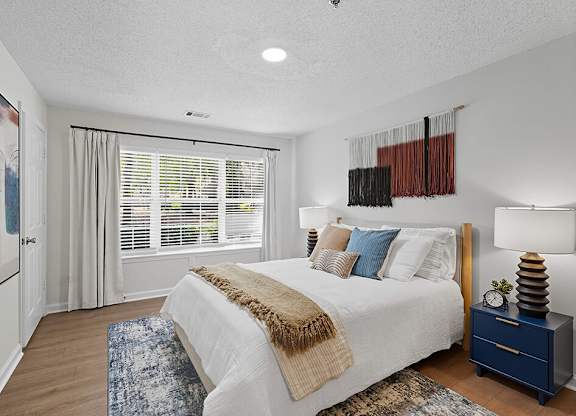 Bedroom with window at Chroma Park Apartments in Austell GA