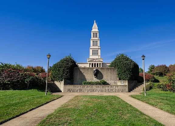 The George Washington Memorial Monument is a large white building with a steeple at Belhaven Apartments in Alexandria VA