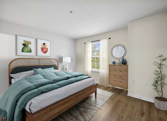 Primary bedroom at Riverwoods Apartments in Woodbridge VA