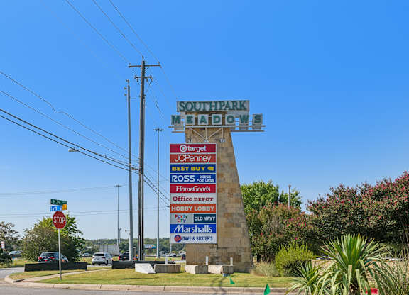 A sign for Southpark Mall with various stores listed on it.