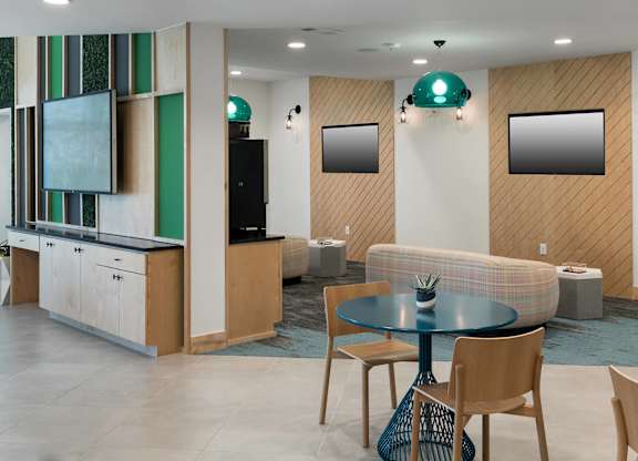 Clubhouse communal area at Jada Legacy Central Apartments in Plano TX