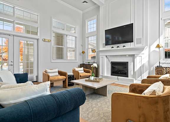 Clubroom with seating area at Grand Oaks Apartments in Chester VA