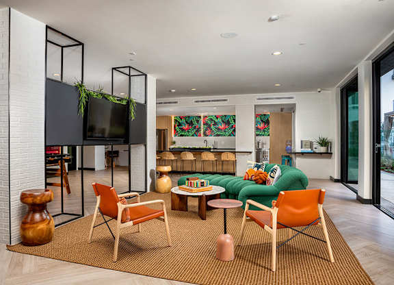 Clubroom Jive Seating Area and Kitchen at Chroma Apartment Homes in Canoga Park CA
