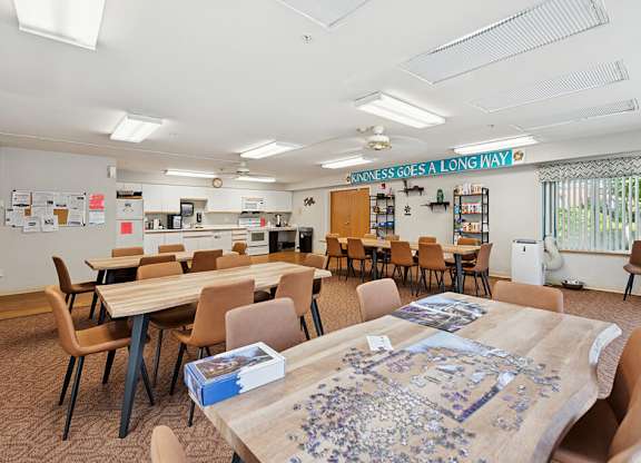 Community room seating area at Lakewood Meadows Apartments in Lakewood WA