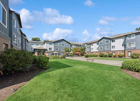Courtyard grass area at Lakewood Meadows Apartments in Lakewood WA