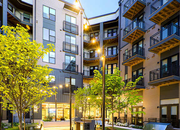 Courtyard at dusk at 333 Ellington Apartments in Gaithersburg MD