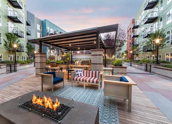 Courtyard Fire Table at Dusk at North at Totem Lake Apartments in Kirkland WA