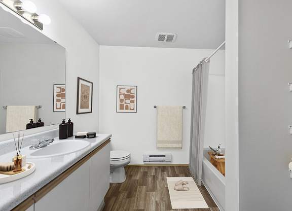 Bathroom with sink and shower at Lakewood Meadows Apartments in Lakewood WA