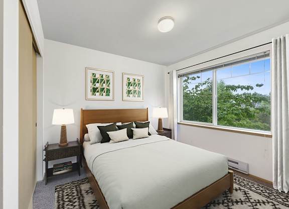 Staged bedroom at Lakewood Meadows Apartments in Lakewood WA