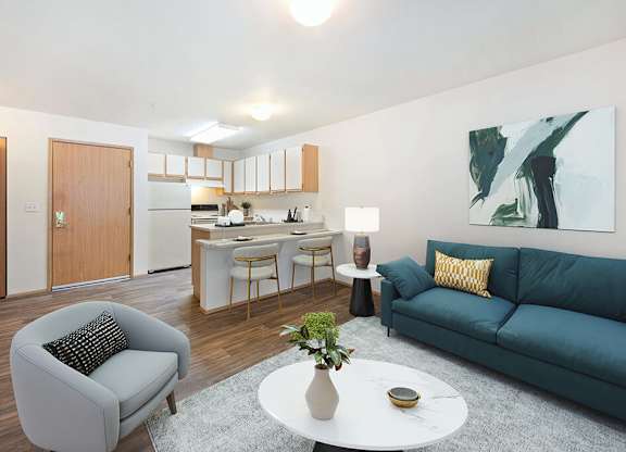 Living room with ample lighting at Boardwalk in Olympia WA