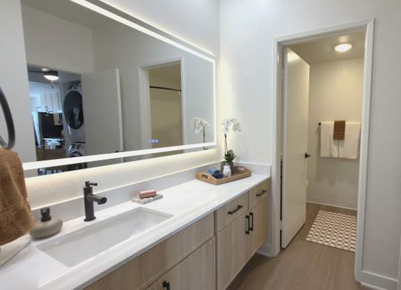 Bathroom with sink at The Resort at Encinitas Apartments in Encinitas CA