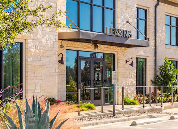 Outdoor leasing entry at Cala Apartments in Austin TX
