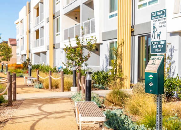 Exterior building and walking path Exterior Courtyard Bocce Ball Court Close Up at Bevel Apartments in San Diego CA