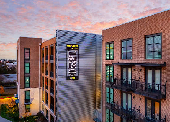 Exterior Building Dimmed at Heights at 1520 Apartments in Houston TX