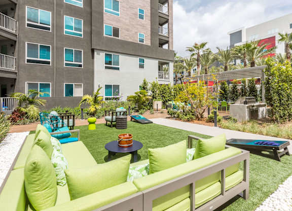 Outdoor courtyard couches at Avel Apartment Homes in Orange CA