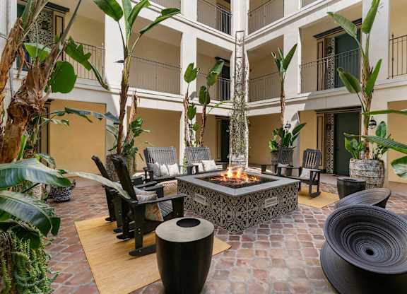 xterior Courtyard The Hearth Fire Featureat Cardio Equipment at Candara at Hancock Park Apartments in Los Angeles CA