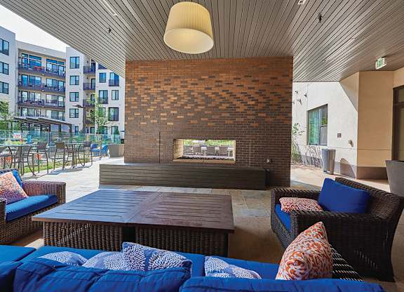 Poolside Fireplace Lounge at The Douglas Apartments in Denver